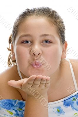 girl giving flying kiss