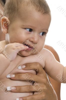 cute baby sucking his fingers