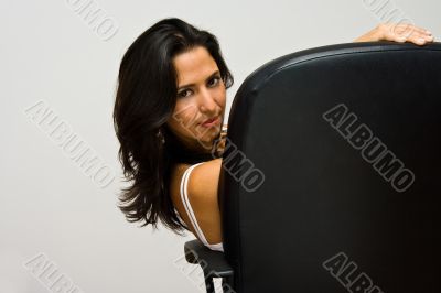 Latina sitting in chair