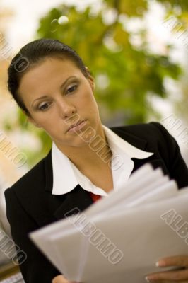 attractive businesswoman with documents