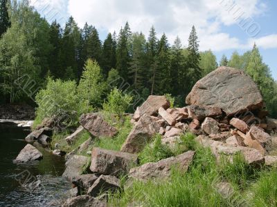 Boulders on a river bank