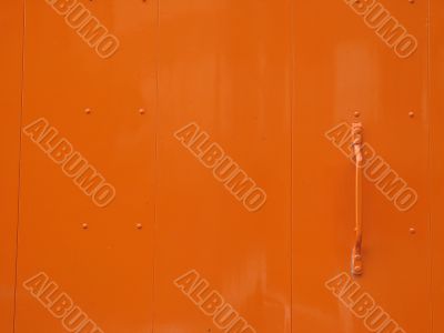 slick orange metal door