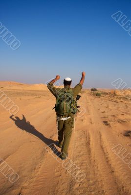 Israeli soldiers excersice in a desert