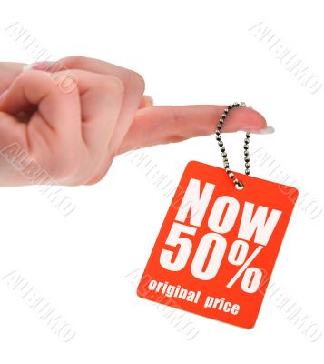 hand holding price tag hand holding price tag