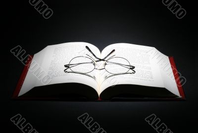 open book on dark background