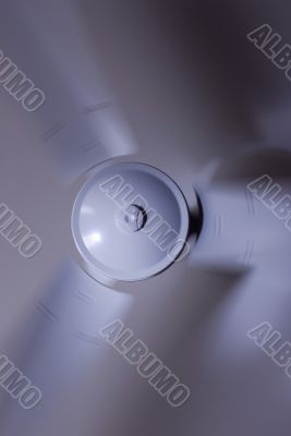 a modern white ceiling fan