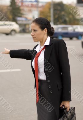 hitchhiking businesswoman