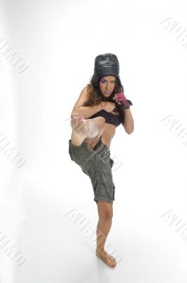 female fighter kicking