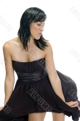 woman`s black dress fluttering in the air