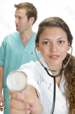 close up of smiling lady doctor with stethoscope