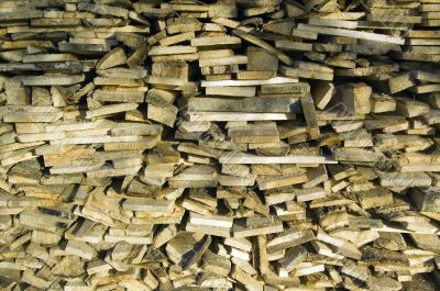 Pile of old firewood background