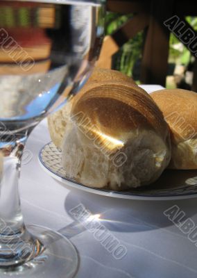 plate of bread on a lunch table