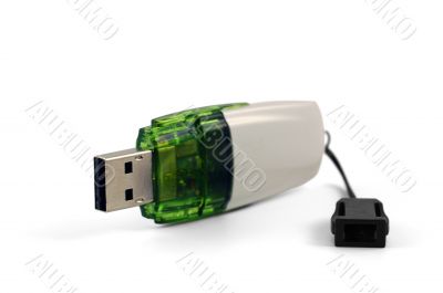 White and green flash drive isolated