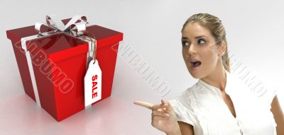 surprised blonde woman pointing to gift