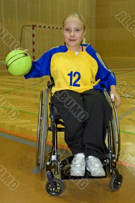 Handicapped person sport handball in the wheelchair