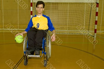 Handicapped person sport handball in the wheelchair