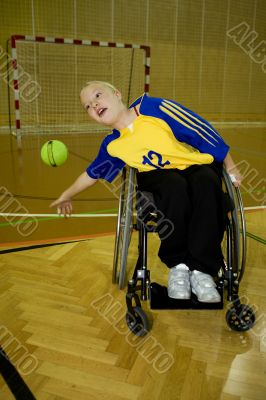 Handicapped person sport handball in the wheelchair