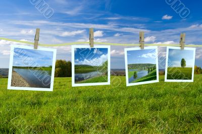 Landscape photographs hanging on a clothesline