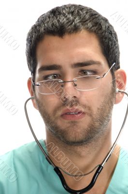 doctor with stethoscope in his ears looking squint