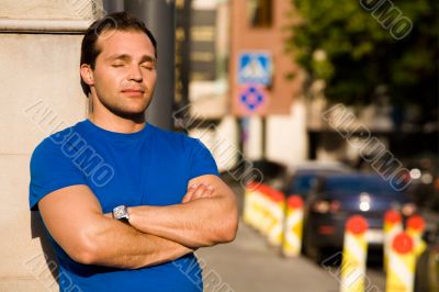 Caucasian man standing on the streets