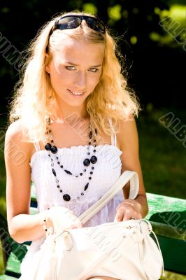 Lovely young woman with handbag Lovely young woman with handbag