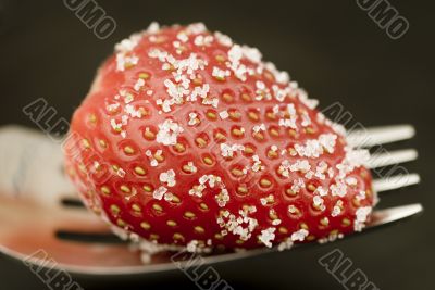 strawberry and fork