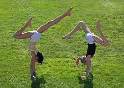 Two girls exercising