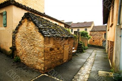 Small street and shed in French village