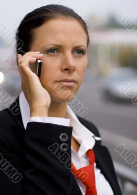 businesswoman talking by mobile phone