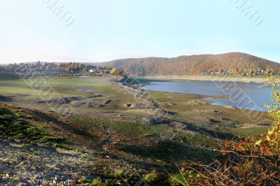 Empty reservoir Edersee in Germany with old ruins