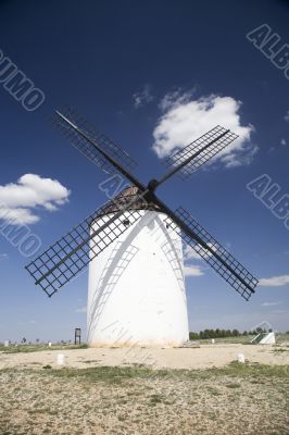spanish mill with cloud