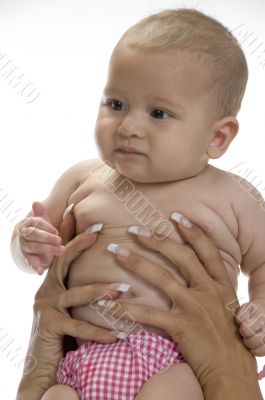 mother hands holding baby
