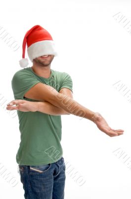 male hiding his face with santa cap