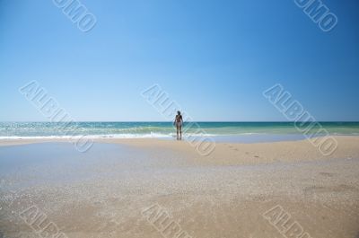 lonely woman at the beach