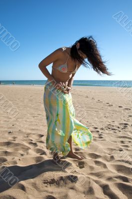 woman with beach wrap