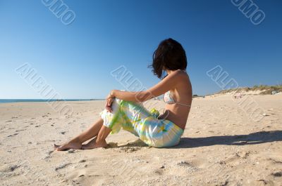 woman sitting at palmar beach