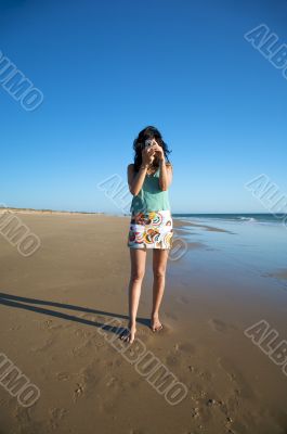taking a picture at the beach
