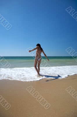 woman walking in the sea
