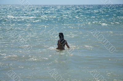 woman in a brilliant sea