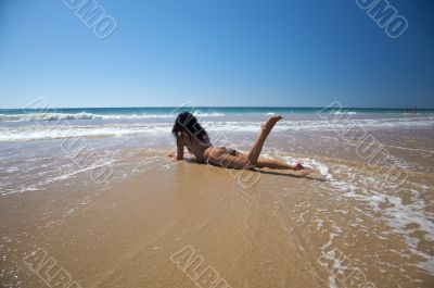 woman lie down on the water