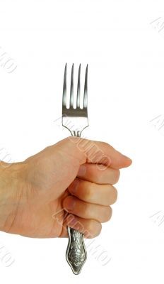 Man`s hand holding a fork