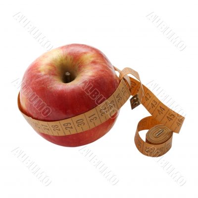 Red apple with measuring tape
