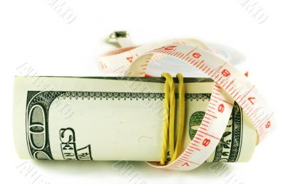 One hundred dollar bill roll - dollar grows thin