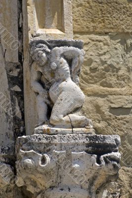 Amatrice - Statue on the facade of Sant`Agostino church Amatrice - Statue on the facade of Sant`Agostino church