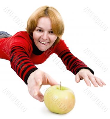 Woman giving a hand to apple Woman giving a hand to apple