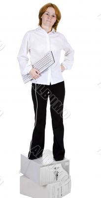 Girl standing on two computers