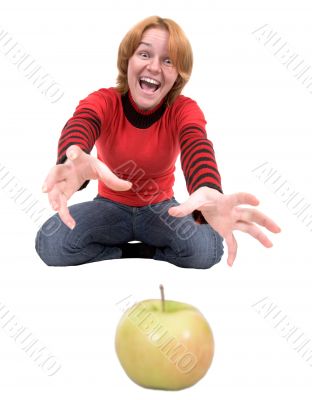 Woman stretch a hand to apple