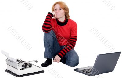 Girl with the laptop and a typewriter