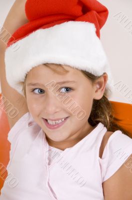 smiling little girl with christmas hat