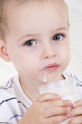 little boy drinking milk